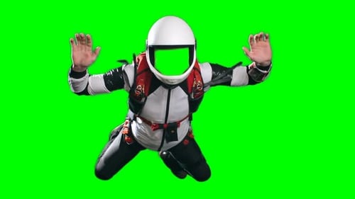 Skydiver with chroma key on green screen