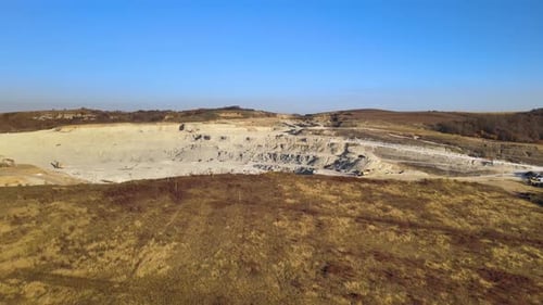 Aerial View of Open Pit Mine of Sandstone Materials for Construction Industry with Excavators and