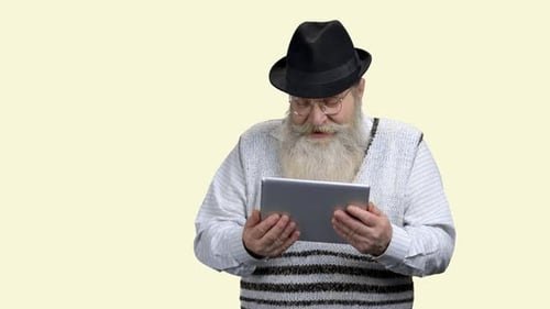 Senior Man Using Digital Tablet Device