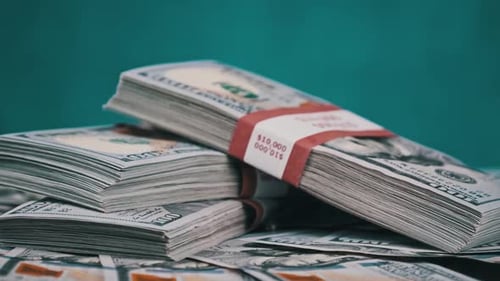 Bundled Stacks of Money on Pile of Cash
