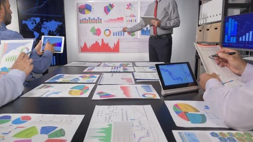 Business Meeting with Charts and Graphs Presentation