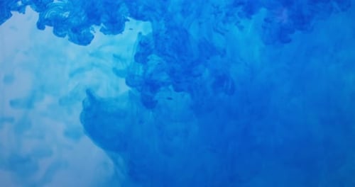 Blue Ink Flowing Dreamily in Water
