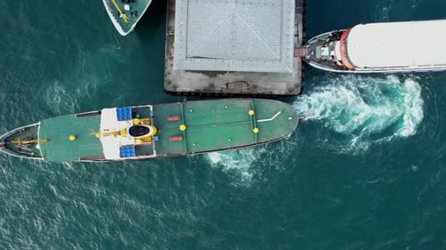 Aerial Ferry Leaving The Pier