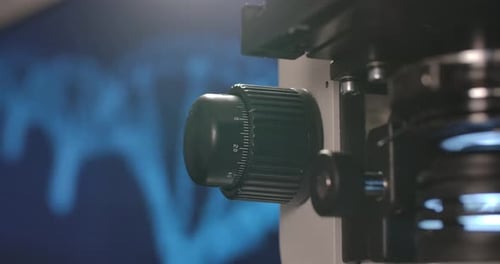 Microscope Focus Adjustment in Medical Lab