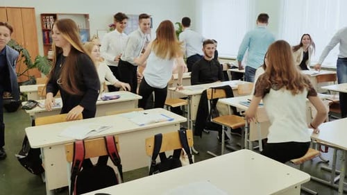 Teens in a Classroom Talking to Each Other