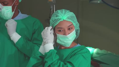 Medical Professionals Preparing in Operating Room