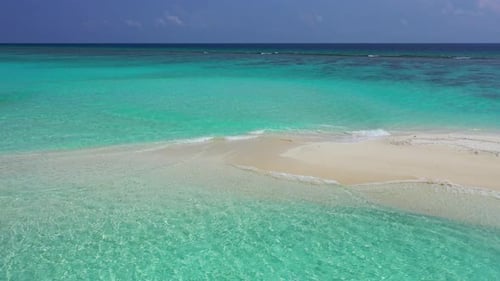 Luxury fly over abstract shot of a white sand paradise beach and aqua blue water background in color
