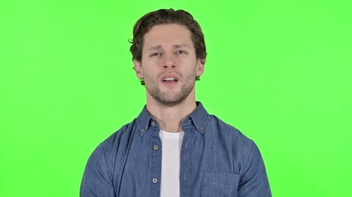 No Gesture By Young Man on Head Shake on Green Chroma Key