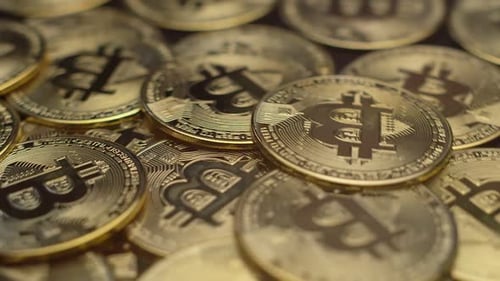 Pile of Gold Bitcoin Cryptocurrency Coins Close Up