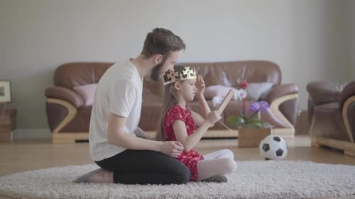 Bearded Father Playing Dress Up with Child