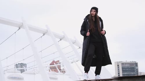 Stylish Brunette Woman Posing in Urban Setting