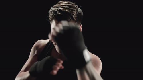Male Boxer Punching and Jabbing Close Up