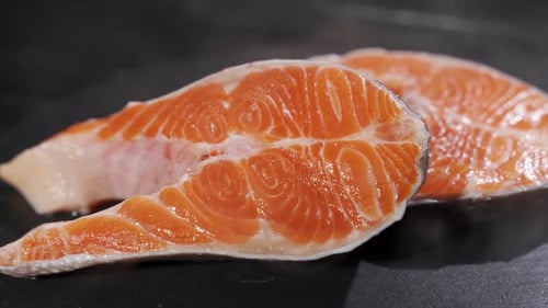 Close Up of Two Fresh Salmon Steaks