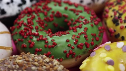 Colorful Donuts with Sprinkles and Various Toppings