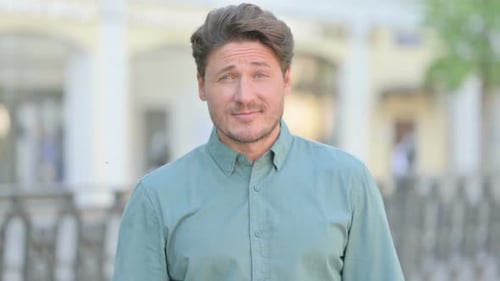 Man Invites Someone to Come Closer