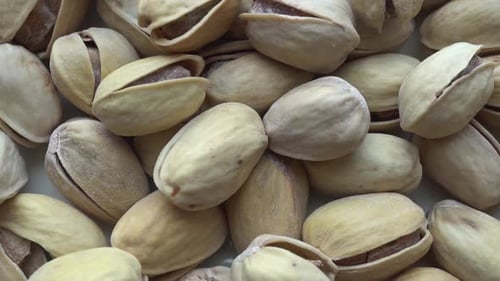 Pistachios Nuts Rotating in a Close Up