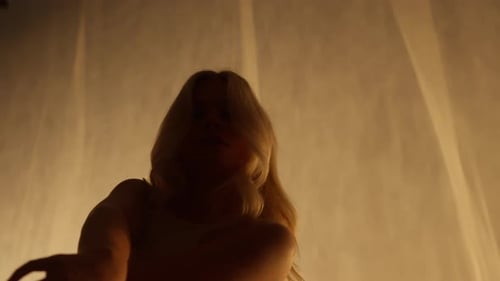 Closeup of a Professional Dancer Performing in Studio in Soft Warm Lighting