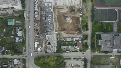 Contrast of construction and residential yards
