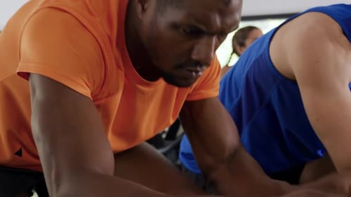 Working out on exercise bikes at a gym