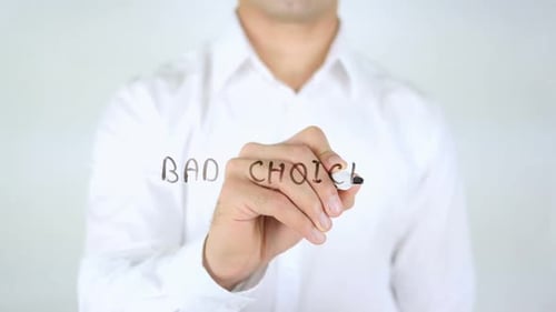 Man Writes Bad Choice on Clear Surface