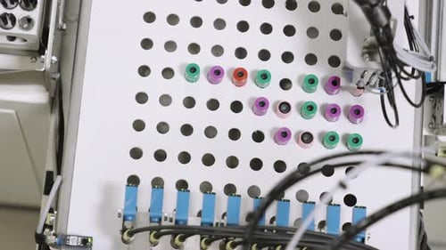 Automated Machine Sorting Vials in Medical Lab