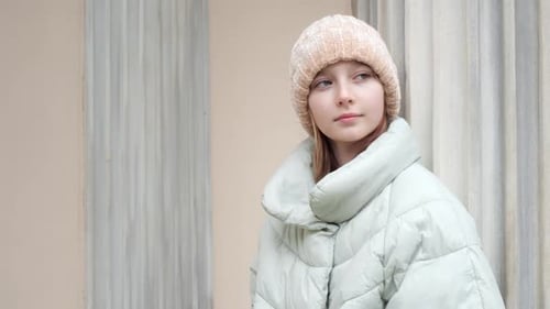 Portrait of Pensive Teenage Girl Looking Sideway in City