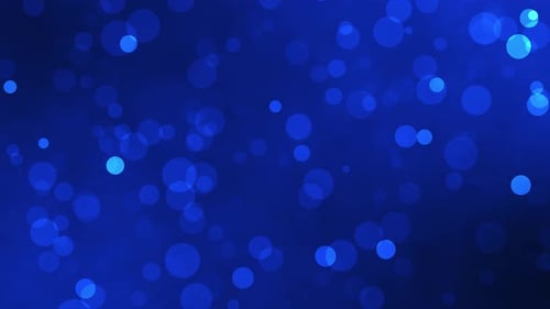Dynamic Blue Bokeh Light Particle Background