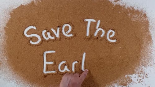 Save the Earth Finger Written in Brown Powder
