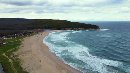High and powerful waves coming fast to the beach, waves in winter day