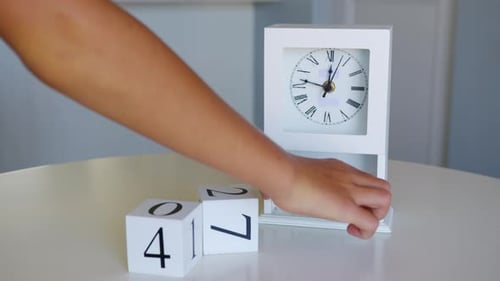 Change the Date on the Wooden Calendar on February 14 or Valentines Day