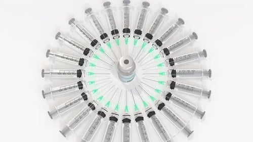 Vaccine Vial Revealed By Circular Syringes Medical Animation