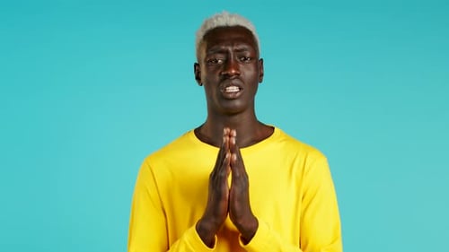 Young Adult in Yellow Shirt Talking