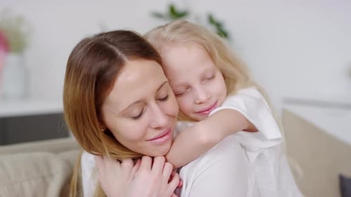Loving Mother and Child Embrace in Home