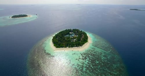Aerial drone view of scenic tropical islands in the Maldives.