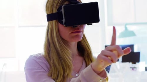Woman Using VR Headset, Gesturing in Virtual Reality