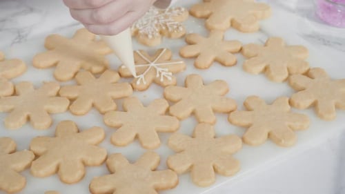 Festive Snowflake Cookies Decorated for Winter Holiday