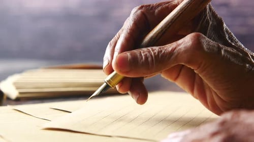 Senior Women Writing with Fountain Pen on Paper