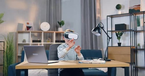 Child Experiencing Virtual Reality in Modern Home