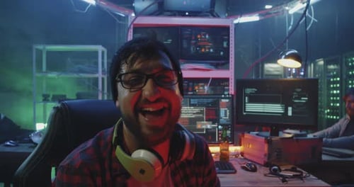 Excited Young Coders Hacking in a Dark Room