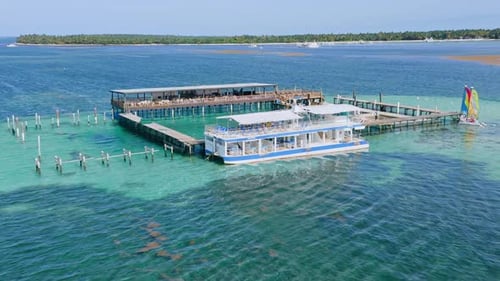 Aerial orbiting at dolphin pool structure of ocean adventure park of Punta Cana in Dominican Republi
