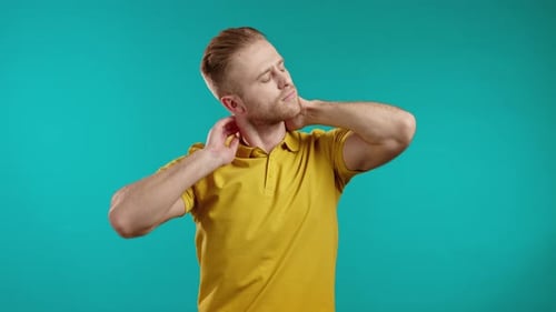 Man Stretching Neck for Pain Relief