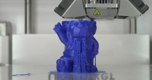 Close up of 3D Printer Making Blue Bear