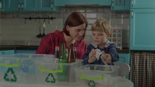 Mother and Son Recycling in the Kitchen