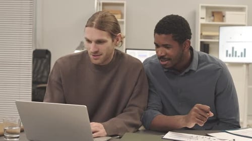 Multiethnic Colleagues Coworking in Office