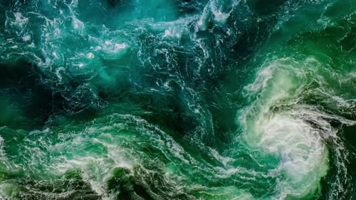 Waves of Water of the River and the Sea Meet Each Other During High Tide and Low Tide.