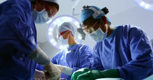 Surgeons performing operation 4k