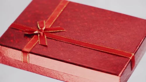 Red Gift Box with Ribbon Close Up