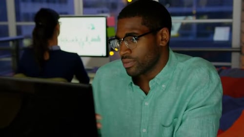 Businessman making video call on computer in a modern office 4k