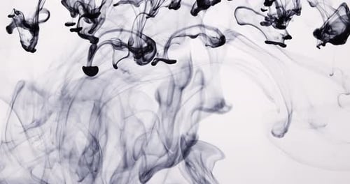 Abstract Ink Plumes Flowing on White Background