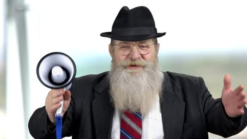 Man with Beard Holding Megaphone Close Up